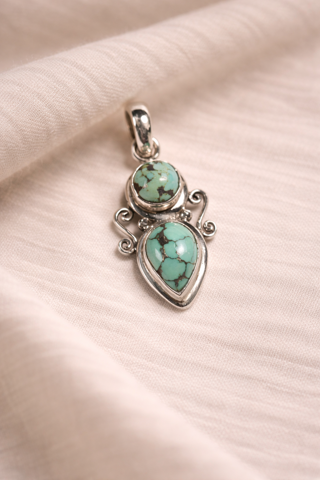 Turquoise Echo Silver Pendant